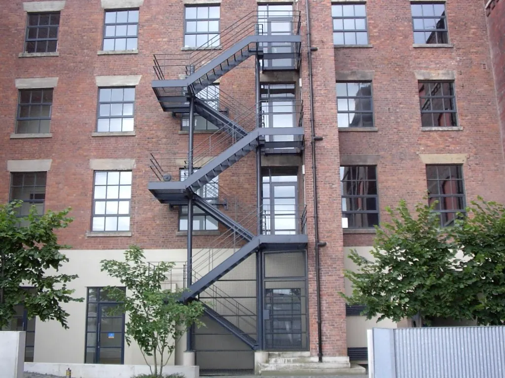 External steel fire escape staircase fabricated by MSR for a converted brick warehouse